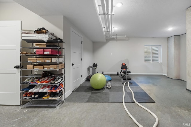 exercise area with baseboards