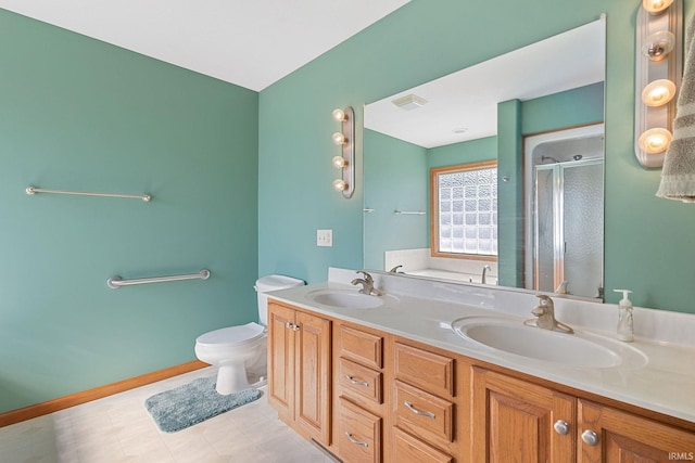 bathroom with toilet, a stall shower, visible vents, and a sink