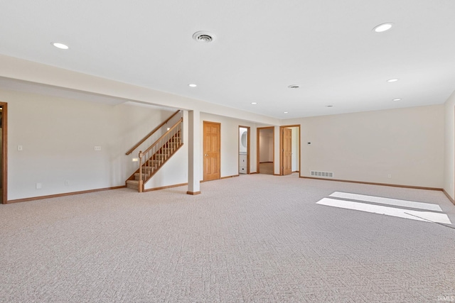 spare room featuring recessed lighting, visible vents, stairway, and baseboards