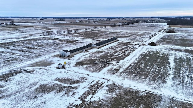 snowy aerial view with a rural view