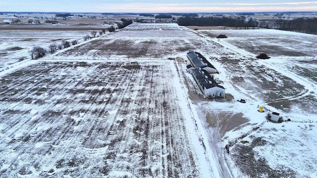 snowy aerial view with a rural view