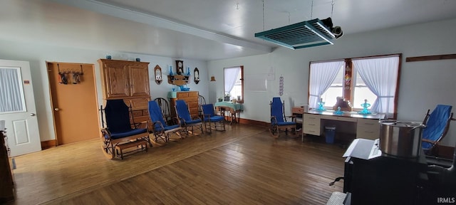 interior space featuring light wood-style floors and baseboards