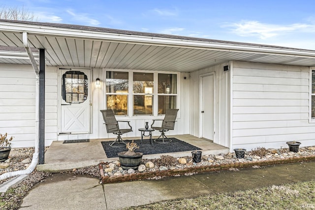 doorway to property with a porch