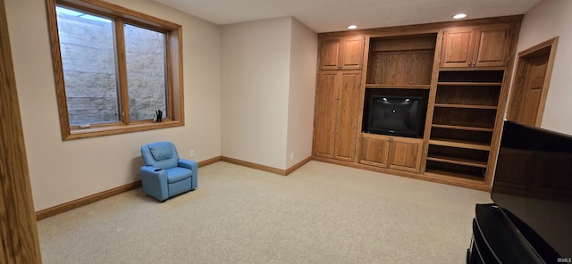 unfurnished room featuring recessed lighting, light colored carpet, and baseboards