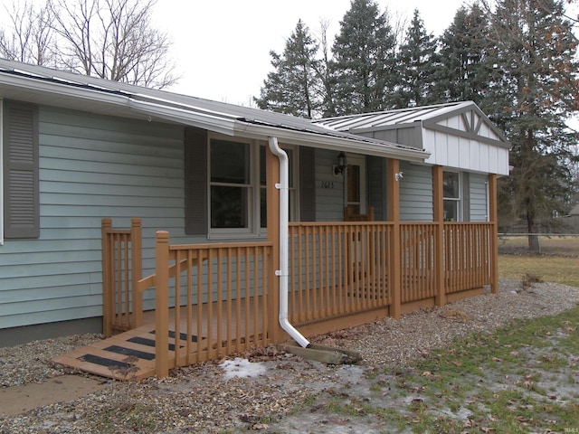 exterior space featuring metal roof