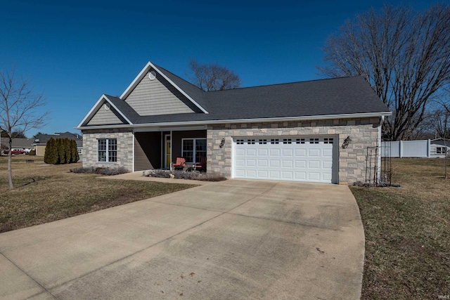 view of front of home with a garage, a front yard, stone siding, and driveway