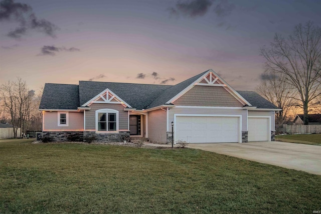 craftsman inspired home featuring a garage, concrete driveway, stone siding, roof with shingles, and a front lawn