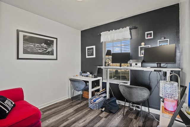 office area with baseboards and wood finished floors