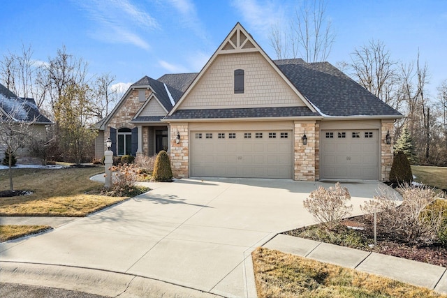 craftsman house featuring an attached garage, stone siding, a shingled roof, and concrete driveway