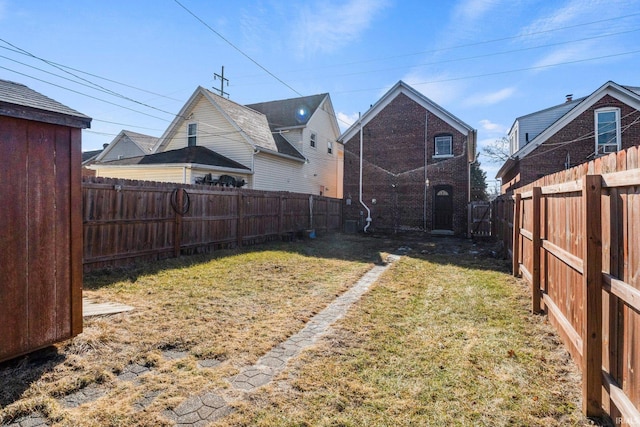 view of yard featuring a fenced backyard