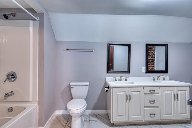 bathroom with double vanity, a sink, baseboards, and shower / bathtub combination