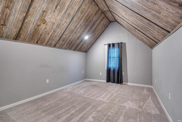 bonus room with wooden ceiling, light colored carpet, vaulted ceiling, and baseboards