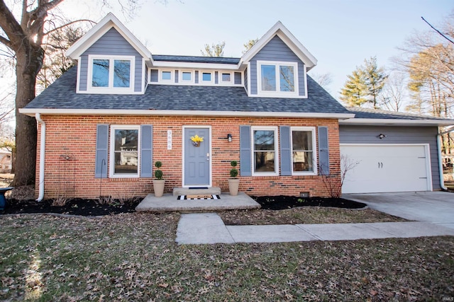 view of front facade featuring driveway, brick siding, an attached garage, and a shingled roof