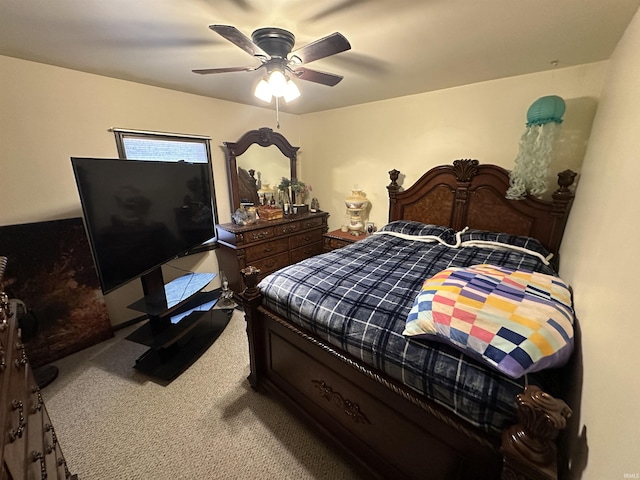 carpeted bedroom featuring a ceiling fan