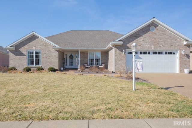 ranch-style home featuring concrete driveway, a front lawn, an attached garage, and brick siding