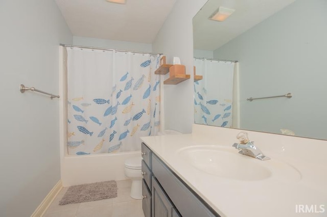 bathroom featuring baseboards, toilet, tile patterned floors, shower / bath combination with curtain, and vanity