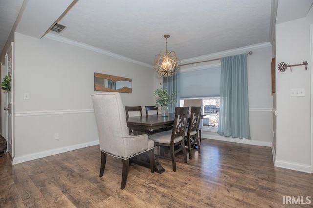 dining room with ornamental molding, dark wood-type flooring, and visible vents