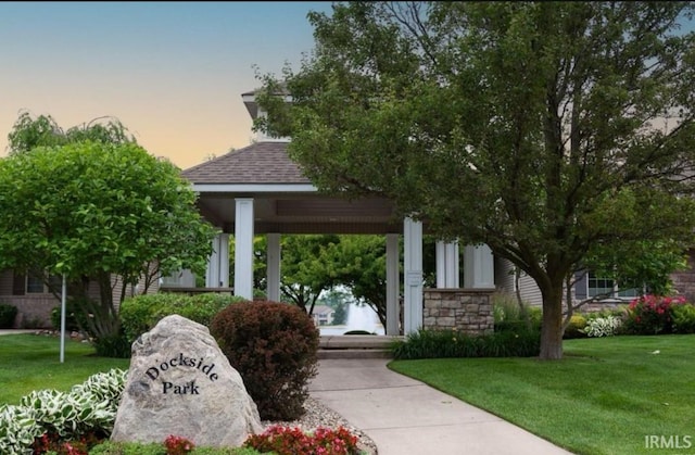 surrounding community featuring a yard and a gazebo