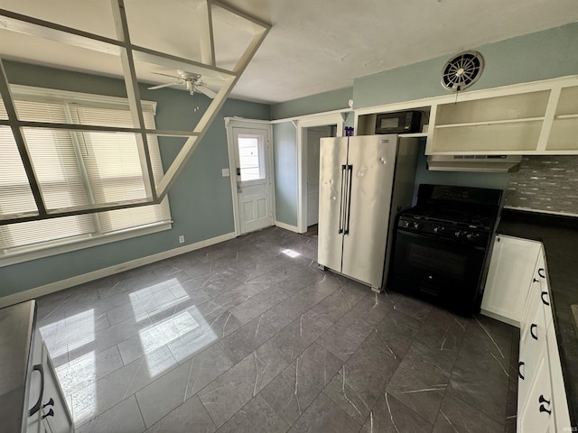 kitchen featuring under cabinet range hood, open shelves, a ceiling fan, baseboards, and black appliances