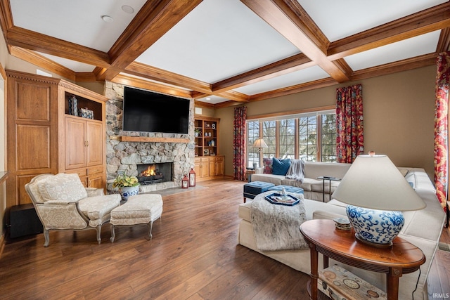 living room with a fireplace, coffered ceiling, wood finished floors, and beamed ceiling