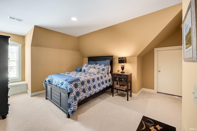 carpeted bedroom with vaulted ceiling, recessed lighting, visible vents, and baseboards