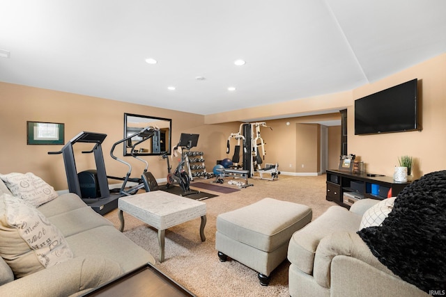 carpeted living area featuring baseboards, visible vents, and recessed lighting