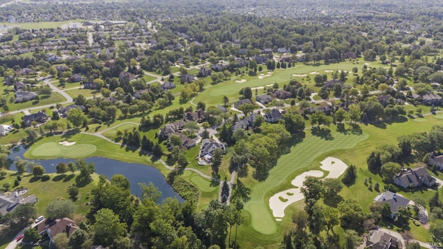 birds eye view of property with a residential view, a water view, and golf course view