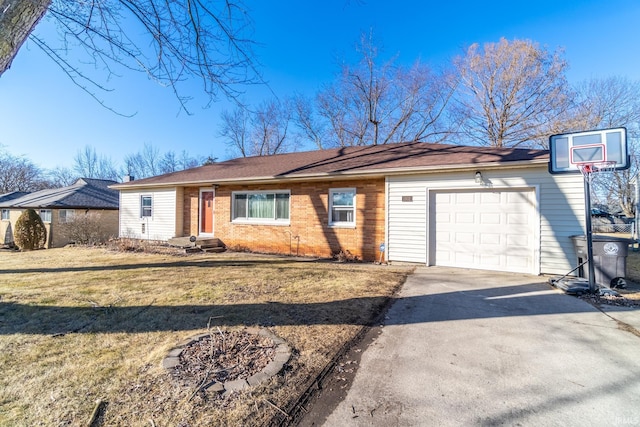 ranch-style home featuring a garage, driveway, brick siding, and a front lawn