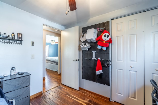 interior space featuring ceiling fan and wood finished floors