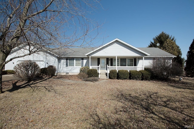 ranch-style home with a porch and an attached garage