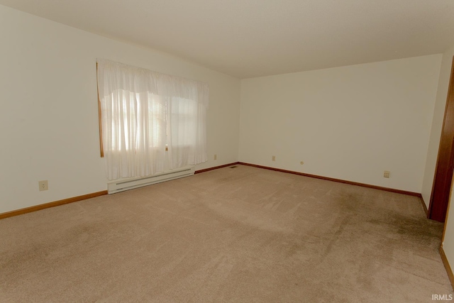 unfurnished room with light carpet, baseboards, and baseboard heating