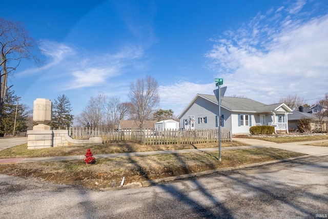 exterior space featuring a fenced front yard