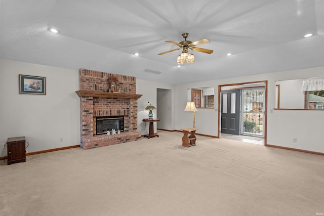 living room featuring recessed lighting, a fireplace, and baseboards