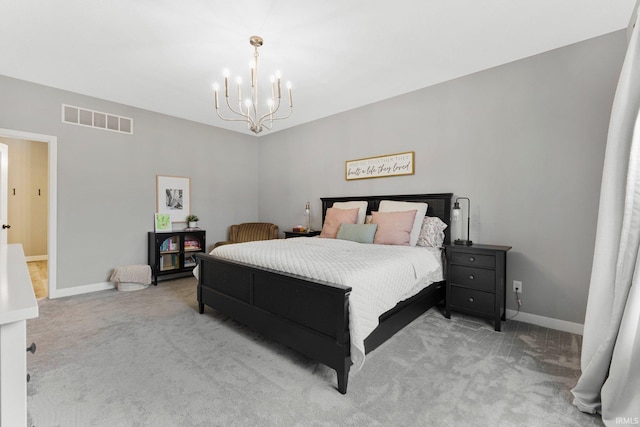 bedroom featuring baseboards, visible vents, a notable chandelier, and light colored carpet