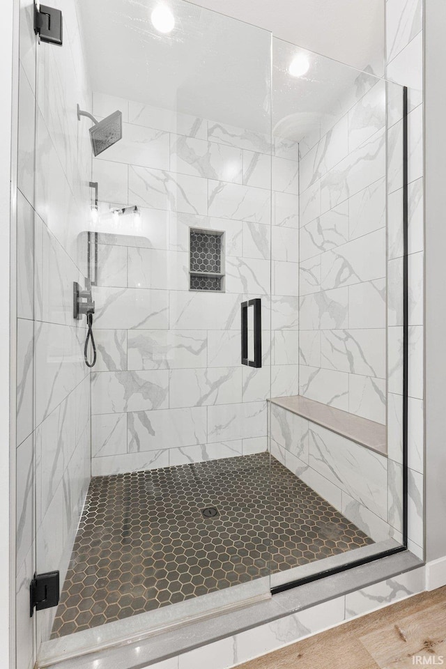 full bathroom with a stall shower