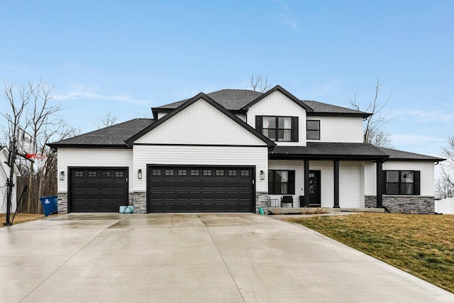 modern farmhouse style home with a porch, stone siding, driveway, and an attached garage