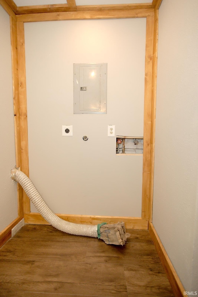 laundry area featuring washer hookup, electric dryer hookup, wood finished floors, laundry area, and electric panel