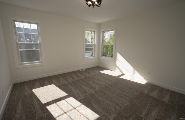 3337 Blarney Dr, South Bend, IN 46628 - spare room with carpet, plenty of natural light, and baseboards