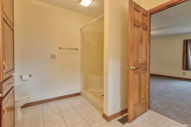 full bath with baseboards, visible vents, toilet, and tile patterned floors