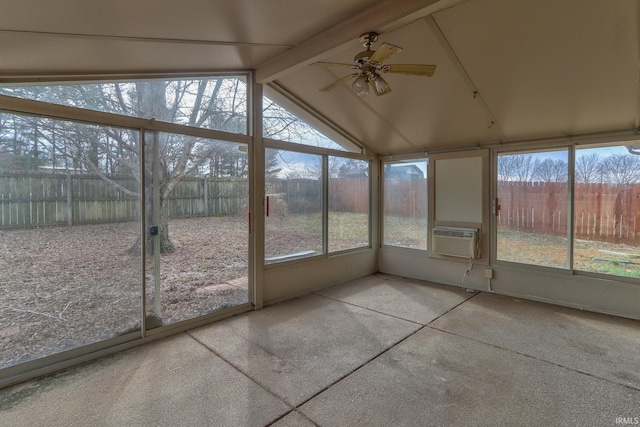 unfurnished sunroom featuring lofted ceiling with beams, a ceiling fan, and cooling unit