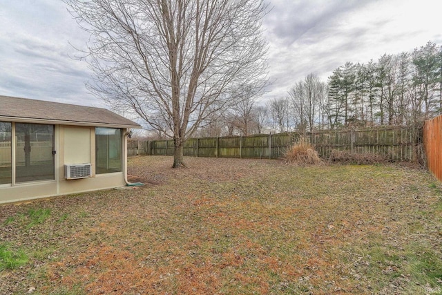 view of yard with a fenced backyard