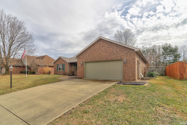 view of front of house featuring brick siding, an attached garage, fence, driveway, and a front lawn