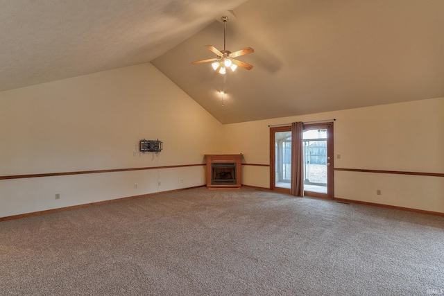 unfurnished living room with light carpet, baseboards, a fireplace, and high vaulted ceiling