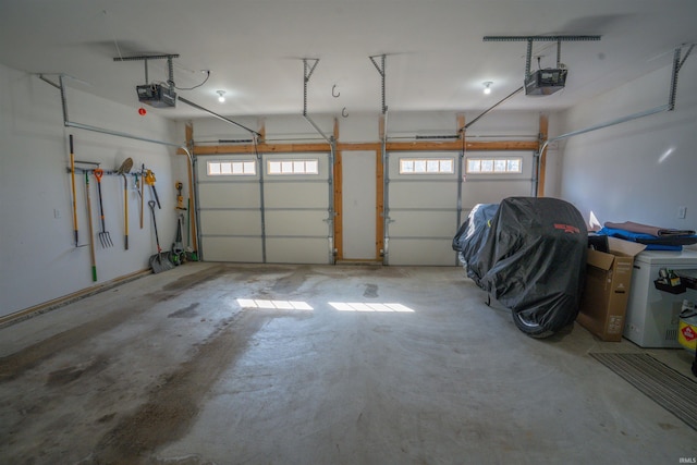 garage featuring a garage door opener