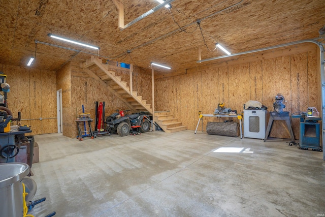 garage with a workshop area