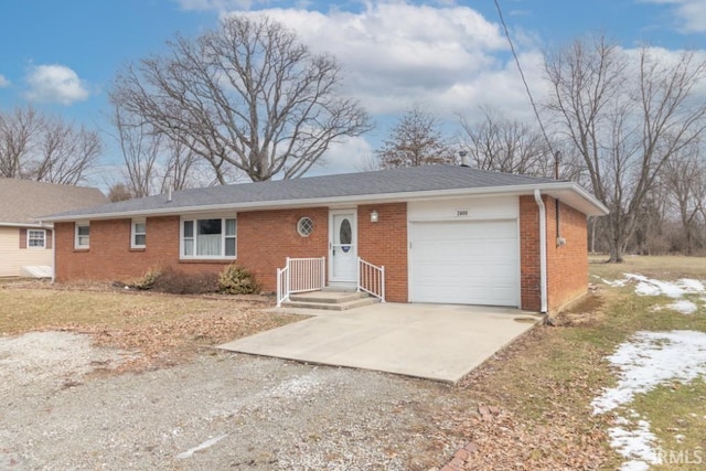 2600 S Main St, New Castle, IN 47362 - ranch-style house with a garage, brick siding, and driveway