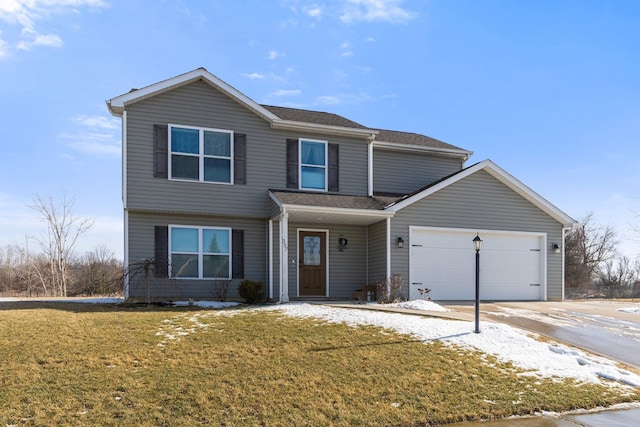 view of front facade with a garage, concrete driveway, and a front lawn