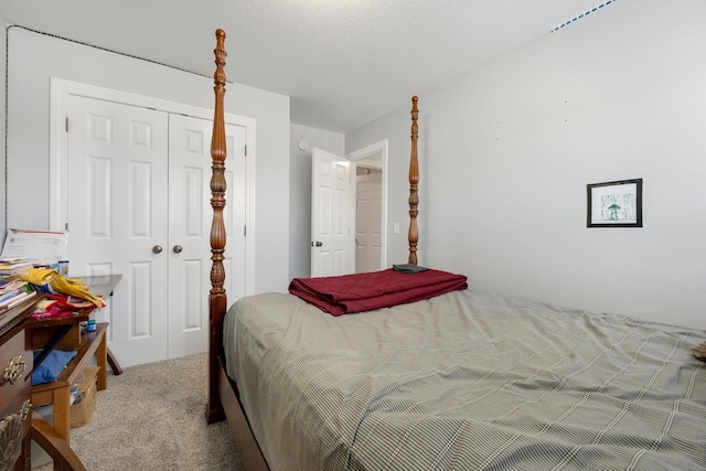 carpeted bedroom with a closet