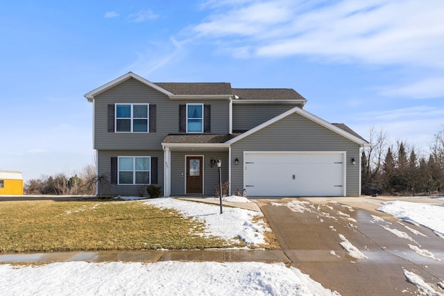 view of front of property with driveway, a yard, and an attached garage