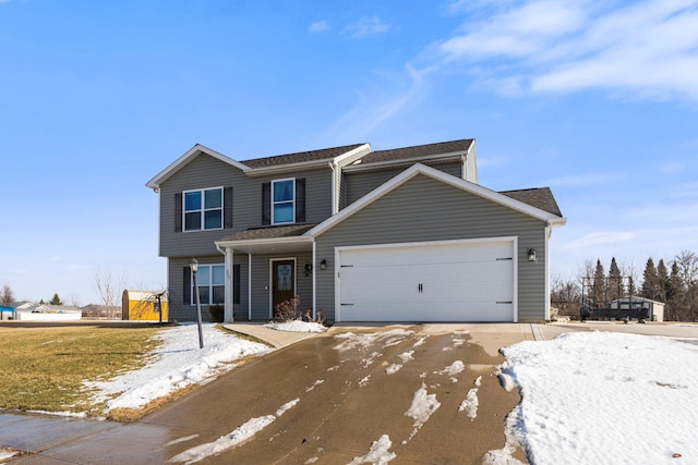 view of front of home featuring a garage and driveway